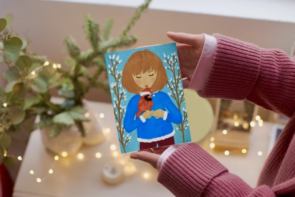 "Snowy Wishes: Cute Girl with Red Cardinal Christmas Card"